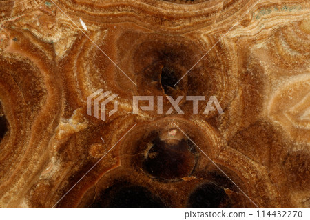 Macro stone mineral onyx marble on a black background 114432270