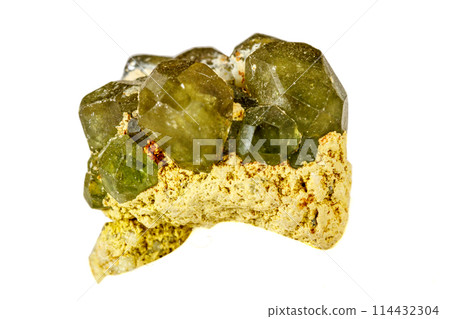 Macro stone Demantoid mineral on white background 114432304