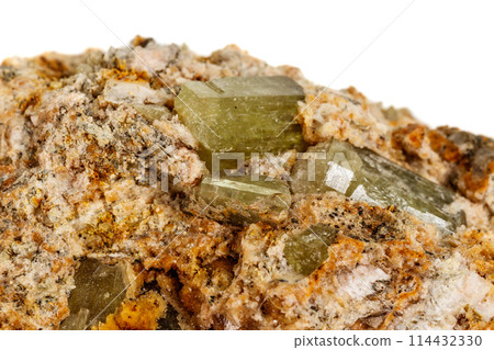 Macro stone Apatite mineral on white background Macro stone Apatite mineral on white background 114432330