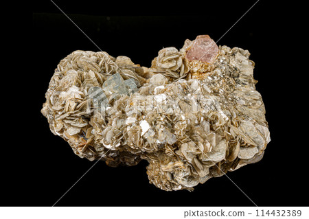 Macro stone Topaz mineral on a black background 114432389