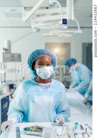 happy attractive first-rate surgeon looking at the camera 114432667