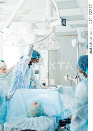 sad unhappy assistant after unsuccessful surgery 114432737
