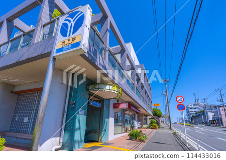 Yokohama cityscape in Japan. View of Odoriba Station Entrance 4 of the Yokohama Municipal Subway. A cat... = May 10th 114433016