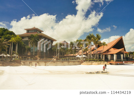 People playing on a tropical beach People playing on a tropical beach 114434219