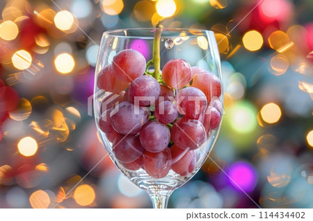 The Spanish New Year's tradition involves eating 12 grapes at midnight, one for each stroke of the clock. This is believed to bring good luck for each month of the coming year. 114434402