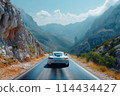 White sports car on a road in a mountain gorge. 114434427