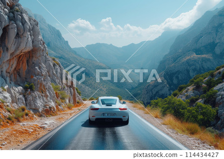White sports car on a road in a mountain gorge. 114434427