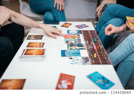 05.11.2024 Krakow, Poland Group of friends playing a dixit game at home 114438049