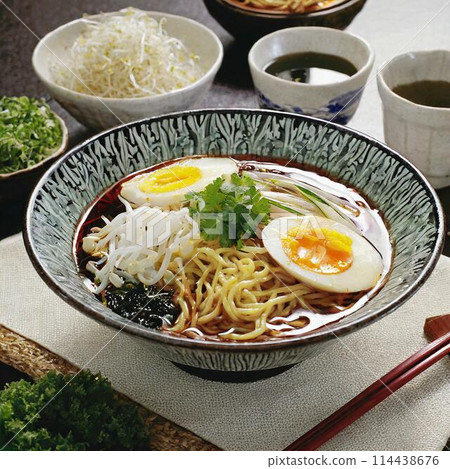A table filled with delicious ramen 114438676