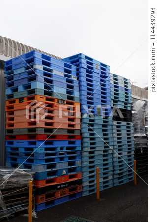 Pallets stacked in a factory 114439293