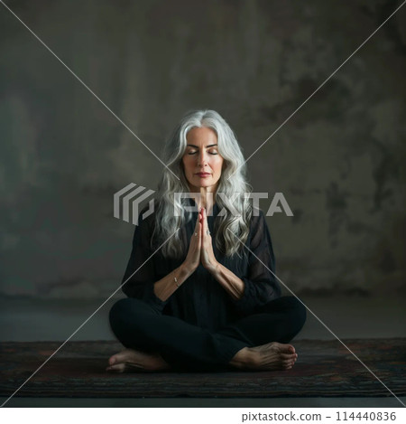 Beautiful gray-haired woman of model appearance meditates --v 6.0 114440836