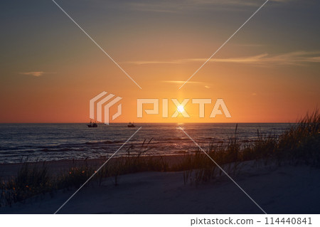 Sunset at the coast of Denmark 114440841