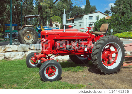 Old wheeled tractor restored 114441236