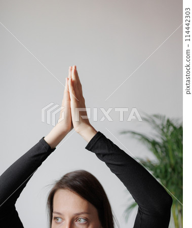 Close-up of hands in palm tree pose, yoga and meditation in gym 114442303