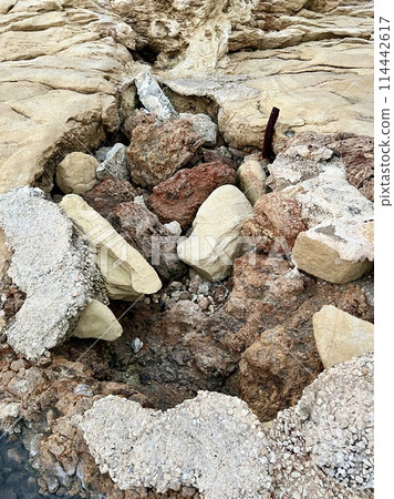 Rocky coast of the Dead Sea, Israel. Close-up. 114442617