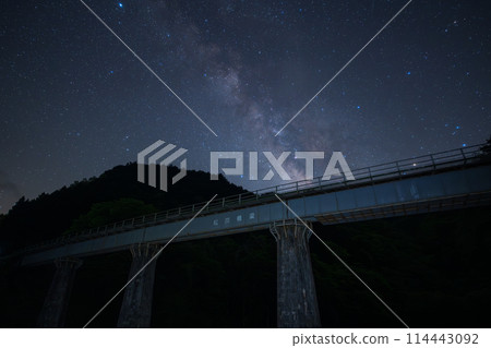The Milky Way floating on a stone iron bridge in Tsuyama, Okayama Prefecture, Japan 114443092