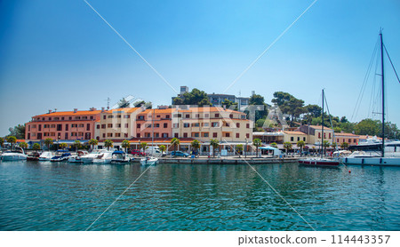 Picturesque coastal Croatia, Rovinj town viewed from water, featuring traditional architecture 114443357