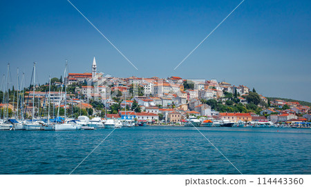 Picturesque coastal Croatia, Rovinj town viewed from water, featuring traditional architecture Picturesque coastal Croatia, Rovinj town viewed from water, featuring traditional architecture 114443360