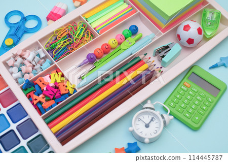 School supplies.Concept back to school. colored stationery is arranged in white organizers. Creative Drawer Organizing. Storage office supplies 114445787