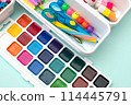 School supplies.Concept back to school. colored stationery is arranged in white organizers. Creative Drawer Organizing. Storage office supplies 114445791