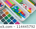 School supplies.Concept back to school. colored stationery is arranged in white organizers. Creative Drawer Organizing. Storage office supplies 114445792