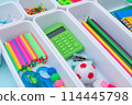School supplies.Concept back to school. colored stationery is arranged in white organizers. Creative Drawer Organizing. Storage office supplies 114445798