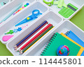 School supplies.Concept back to school. colored stationery is arranged in white organizers. Creative Drawer Organizing. Storage office supplies 114445801