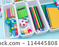 School supplies.Concept back to school. colored stationery is arranged in white organizers. Creative Drawer Organizing. Storage office supplies 114445808