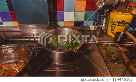 Saucepans in the kitchen 114446162