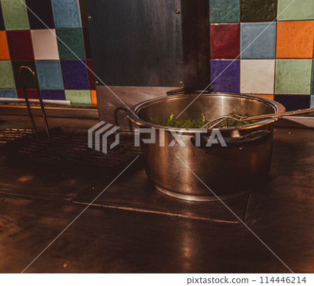 Saucepans in the kitchen 114446214