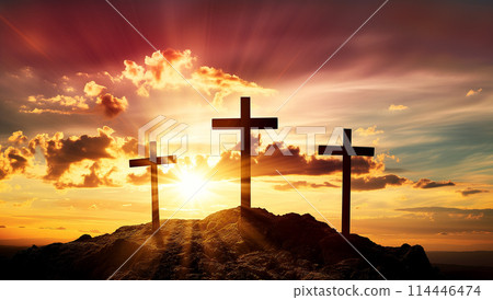 Easter concept three crosses on Golgotha Calvary hill against a dramatic sunset 114446474