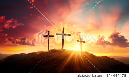 Easter concept three crosses on Golgotha Calvary hill against a dramatic sunset 114446476