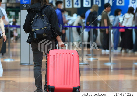 Travelers pulling suitcases Haneda Airport Departure Lobby Travelers 114454222