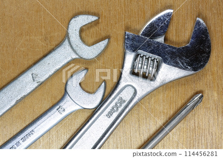 tools placed on a wooden board tools placed on a wooden board 114456281