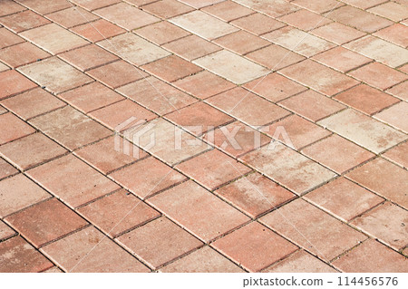 Close up of diagonal red brick flooring with rectangle pattern 114456576