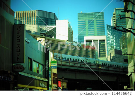 Tokaido Shinkansen bullet train running between Yurakucho and Tokyo Station Tokaido Shinkansen bullet train running between Yurakucho and Tokyo Station 114456642
