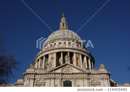 St Paul's Cathedral in London, and the iconic dome building against the sky 114459499