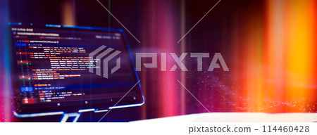 Work from home. Programmer coding code on notebook screen at home. 114460428