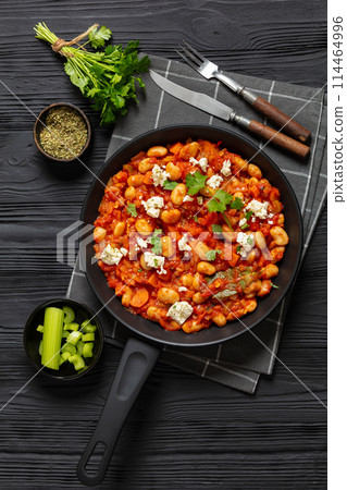 greek giant baked beans with feta on pan 114464996