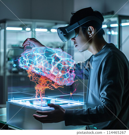 A man in an electric blue virtual reality hat is examining a 3D brain model 114465267
