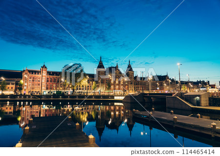 Sunrise at Amsterdam Central Station, Netherlands Sunrise at Amsterdam Central Station, Netherlands 114465414