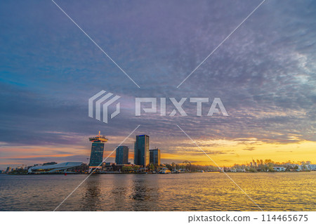Dawn at the IJ Bay across from Amsterdam Central Station, Netherlands Dawn at the IJ Bay across from Amsterdam Central Station, Netherlands 114465675