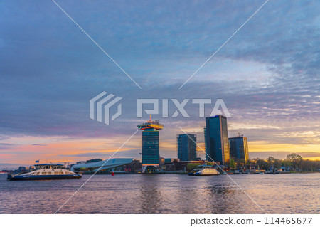 Dawn at the IJ Bay across from Amsterdam Central Station, Netherlands 114465677