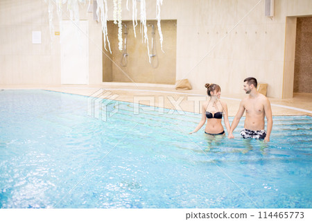 attractive woman and man in resort attractive woman and man in resort 114465773