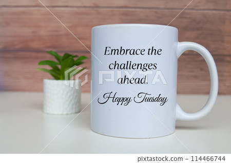Embrace the challenges ahead. Happy Tuesday. Morning greetings concept 114466744