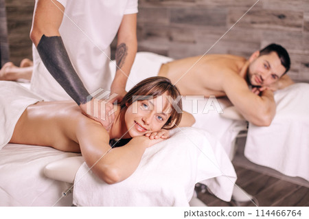 massage for a family. relaxing massage for loving couple at Valentine day massage for a family. relaxing massage for loving couple at Valentine day 114466764