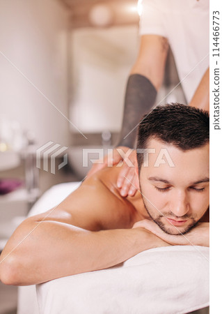 relaxing massage after training, working out 114466773