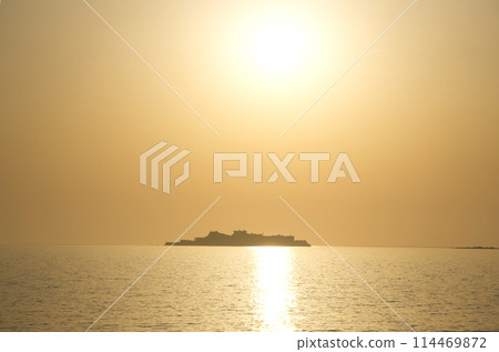 Gunkanjima (Hashima Island) as the sun sets Gunkanjima (Hashima Island) as the sun sets 114469872