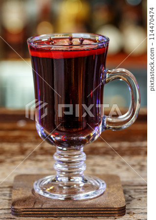 Spicy mulled wine in a glass Spicy mulled wine in a glass 114470474