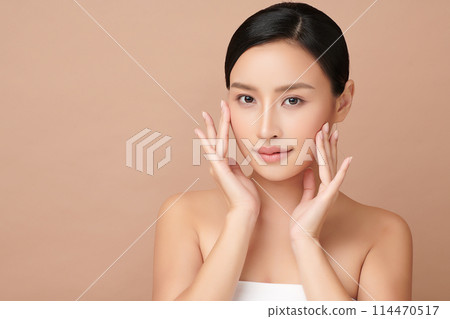 Beautiful young asian woman with clean fresh skin on beige background, Face care, Facial treatment, Cosmetology, beauty and spa, Asian women portrait. 114470517
